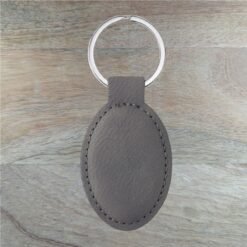 Grey Oval Leatherette Keychain